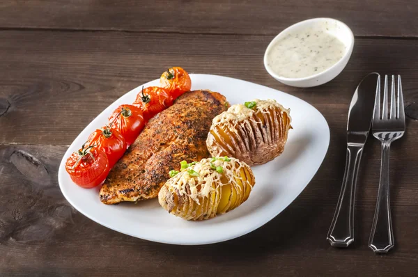 Grilled chicken breast on white plate — Stock Photo, Image