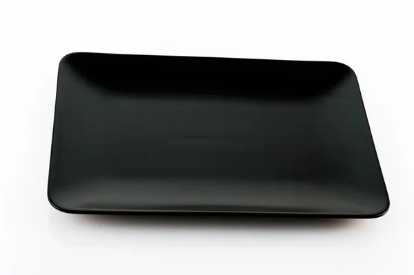 Black plate — Stock Photo, Image