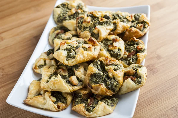 Puff pastry with spinach — Stock Photo, Image