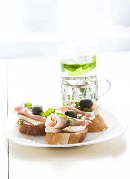 Small sandwich with parma ham and camembert — Stock Photo, Image