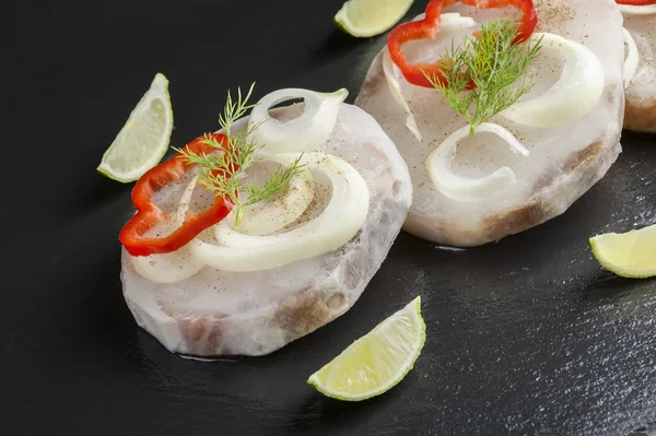 Frozen shark steaks with vegetables ready to cook — Stock Photo, Image