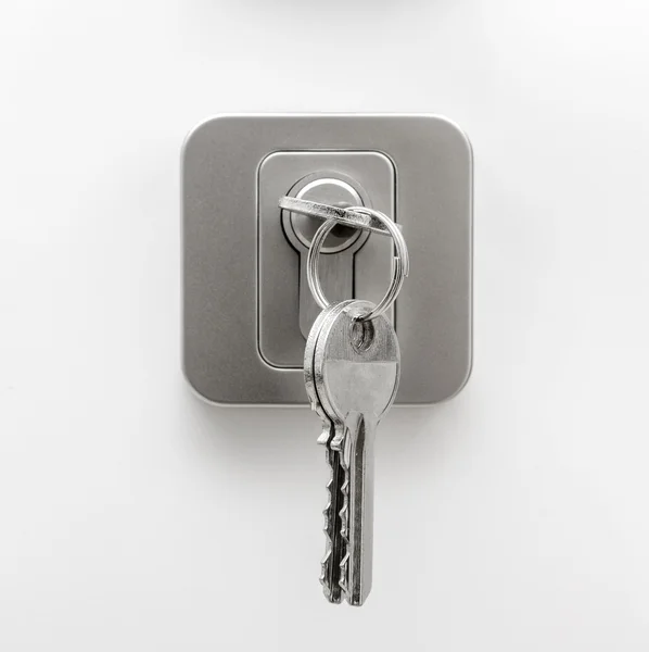 Hausschlüssel am Türschloss — Stockfoto