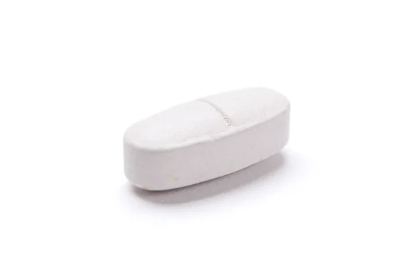 White oval drug, isolated — Stock Photo, Image