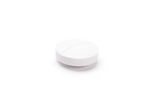 White round tablet, isolated — Stock Photo, Image