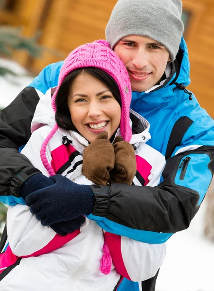 Half-length portrait of embracing happy couple — Stock Photo, Image