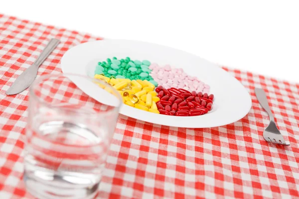 Na stole, na białym tle odżywianie — Zdjęcie stockowe