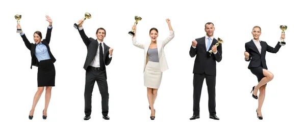 Porträt von Geschäftsleuten, die Pokale halten — Stockfoto
