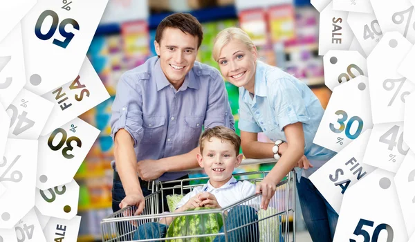 Family drives shopping trolley