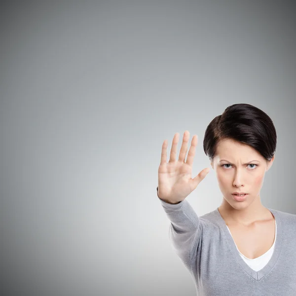 Smart girl shows stop gesture, close up — Stock Photo, Image