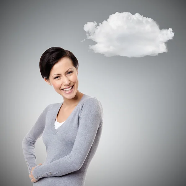 Cheerful young woman and cloud — Stock Photo, Image