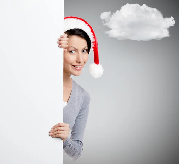 Mulher no Natal boné vermelho — Fotografia de Stock