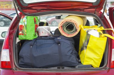 bags and things in the trunk car clipart