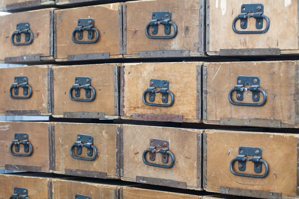 Wooden boxes with metal handles — Stock Photo, Image