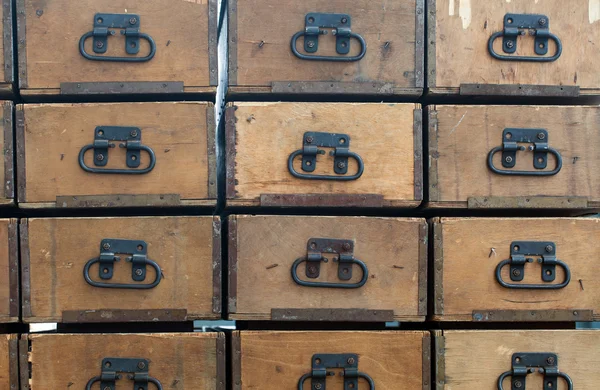 Wooden boxes with metal handles — Stock Photo, Image