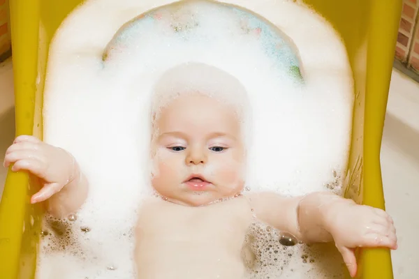 Baby boy in the bath Royalty Free Stock Photos