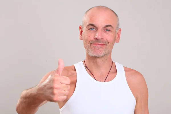 Adult man showing thumb up — Stock Photo, Image