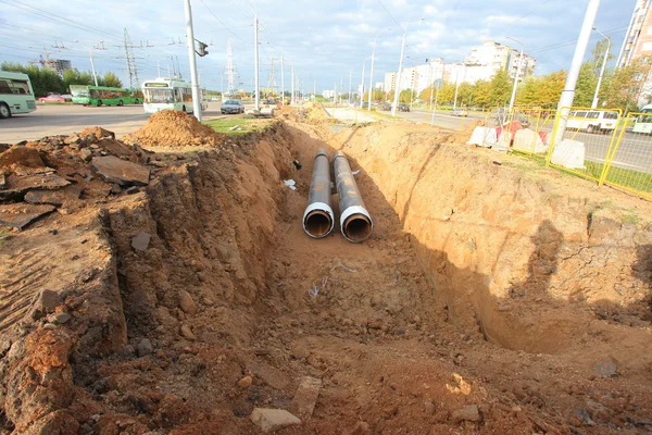 Pipes for water in a trench — Stock Photo, Image