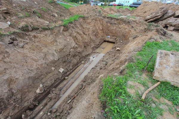 Tuberías para agua en trinchera —  Fotos de Stock