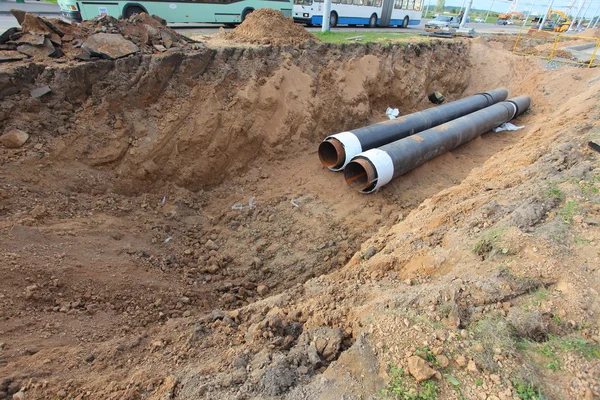 Pipes for water in a trench — Stock Photo, Image