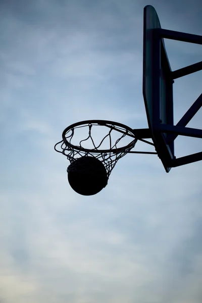 Ring and ball at sunset — Stock Photo, Image