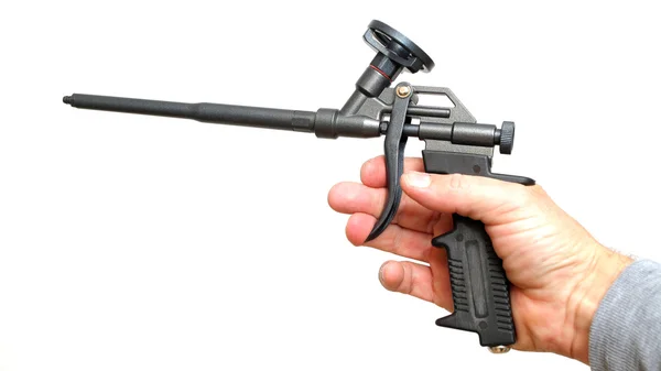 Ręka trzymać airbrush pistolet — Zdjęcie stockowe