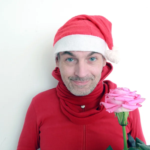 Santa with flower roses — Stock Photo, Image