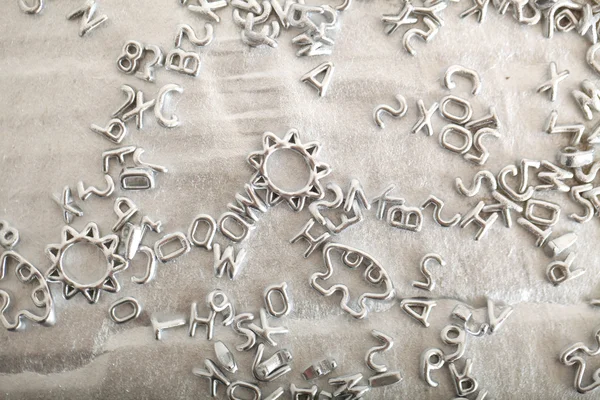 Diferentes letras de prata misturado — Fotografia de Stock