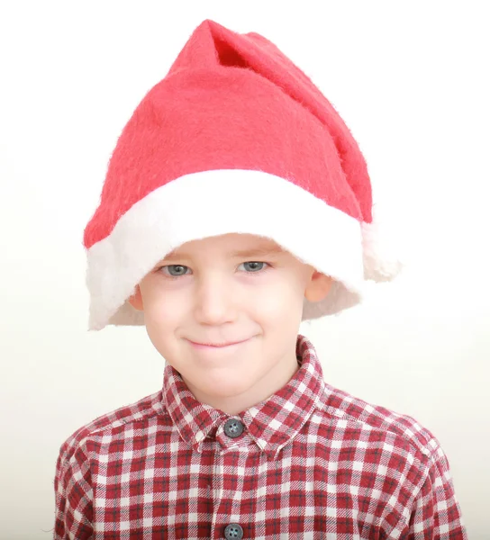 Little boy wearing santa hat — Stock Photo, Image