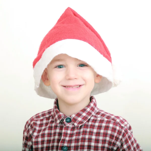 Little boy wearing santa hat — Stock Photo, Image
