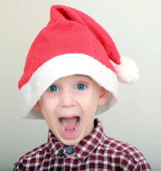 Little boy wearing santa hat — Stock Photo, Image