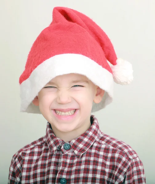 Little boy wearing santa hat — Stock Photo, Image