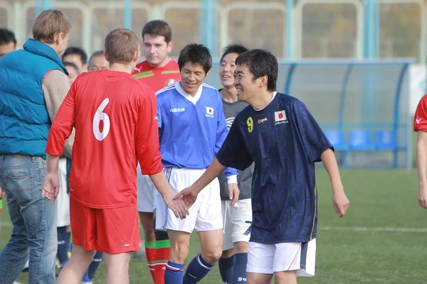 A friendly football match between sports journalists of Japan and Belarus. Minsk, September 2013 — Stock Photo, Image