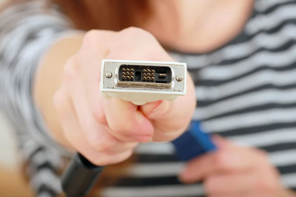 Computer cables in female hand — Stock Photo, Image