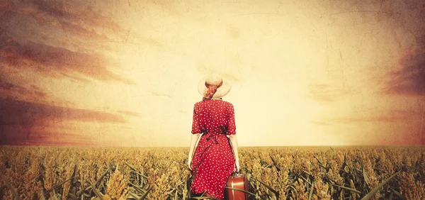 Redhead girl with suitcase — Stock Photo, Image