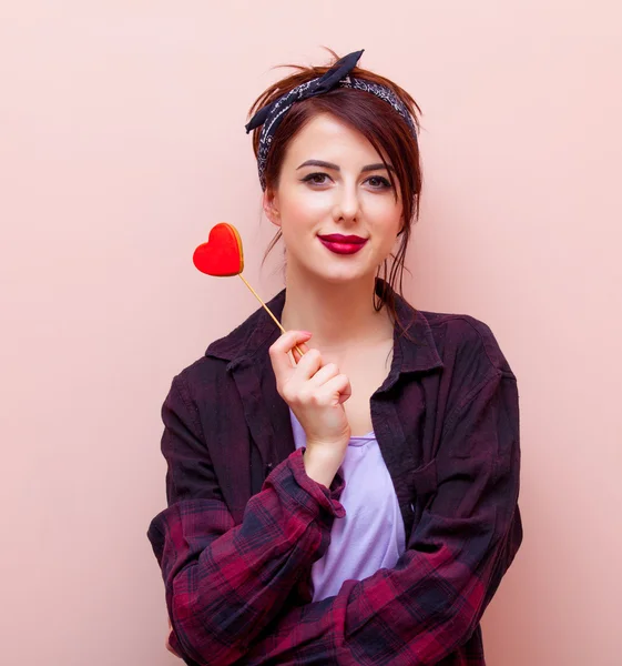 Portrait of a young woman with toy — Stock Photo, Image