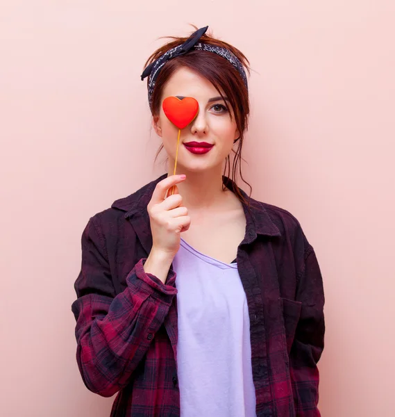 Portrait of a young woman with a toy — Stock Photo, Image