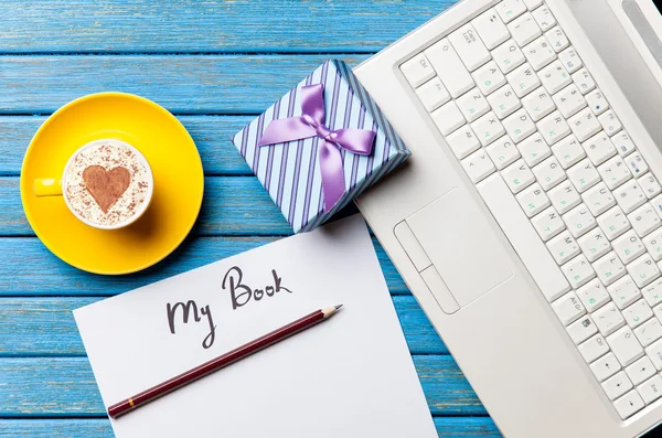 Paper, gift, coffee and laptop — Stock Photo, Image