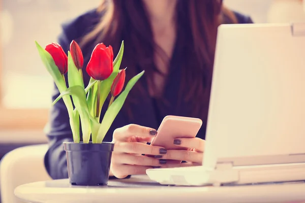Young woman with bunch of tulips — Stock Photo, Image