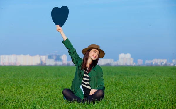 Woman with heart shape toy — Stock Photo, Image