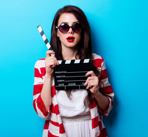 Portrait of the young woman with slapstick — Stock Photo, Image