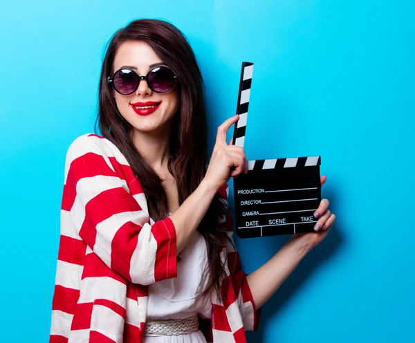 Portrait of the young woman with slapstick — Stock Photo, Image