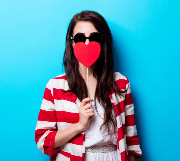 Portret van de jonge vrouw met speelgoed — Stockfoto