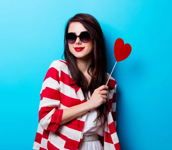 Portrait of the young woman with toy — Stock Photo, Image