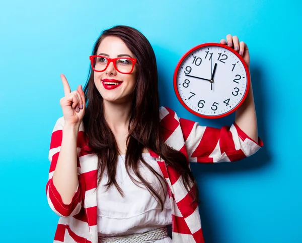 Portrait of the young woman with clock — Stock Photo, Image