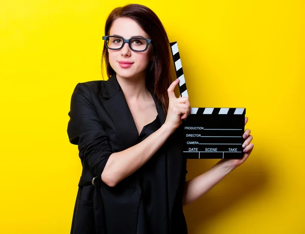 Portrait of the young woman with slapstick — Stock Photo, Image