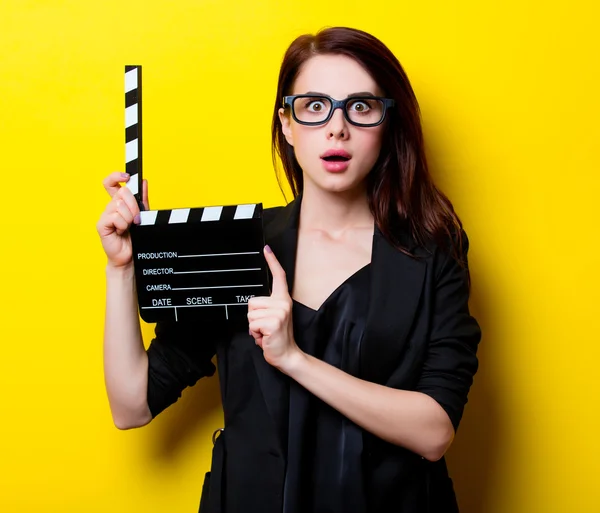 Portrait of the young woman with slapstick — Stock Photo, Image