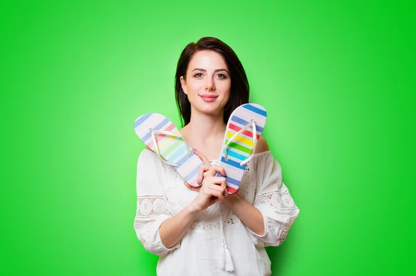 Young woman with sandals — Stock Photo, Image