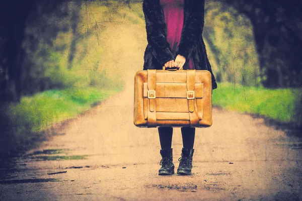 Photo of young woman with suitcase — Stock Photo, Image