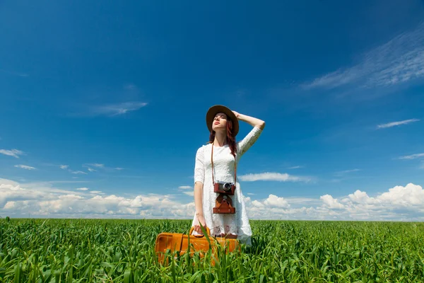 Young woman with suitcase — Stock Photo, Image