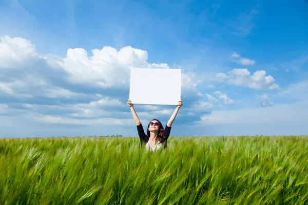 Young woman with poster — Stock Photo, Image